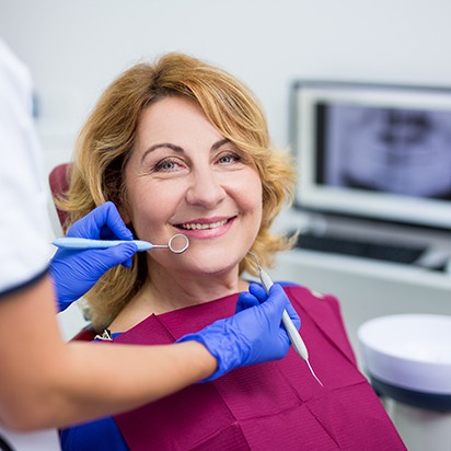 Dental exams are still an important part of caring for your smile even with dental implants