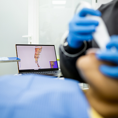 Dental patient having digital impressions of their teeth taken