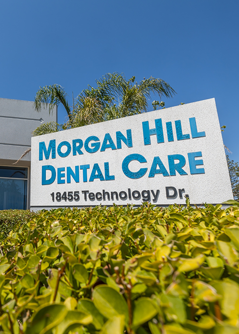 Outdoor sign that reads Morgan Hill Dental Care 18455 Technology Drive