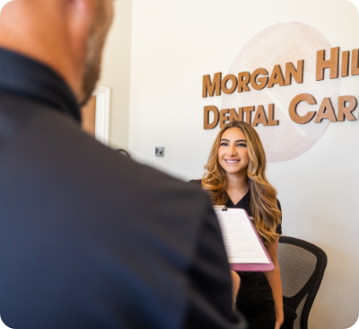 Morgan Hill Dental Care receptionist greeting a patient at front desk