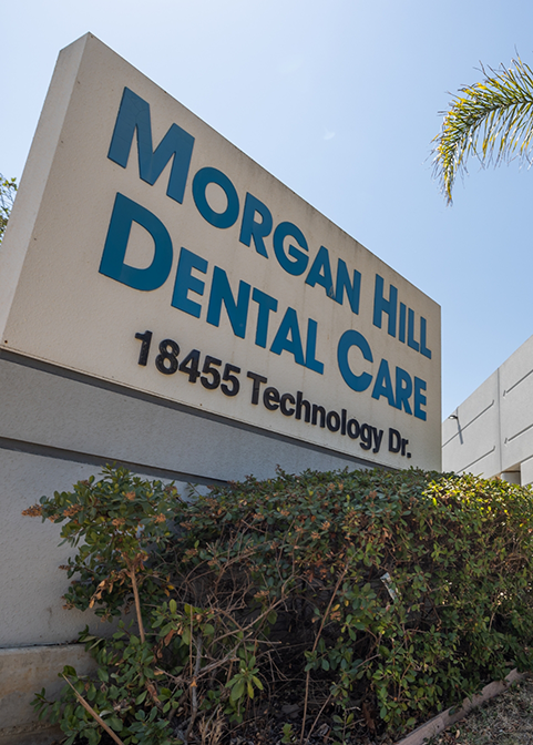 Outdoor sign reading Morgan Hill Dental Care 18455 Technology Drive