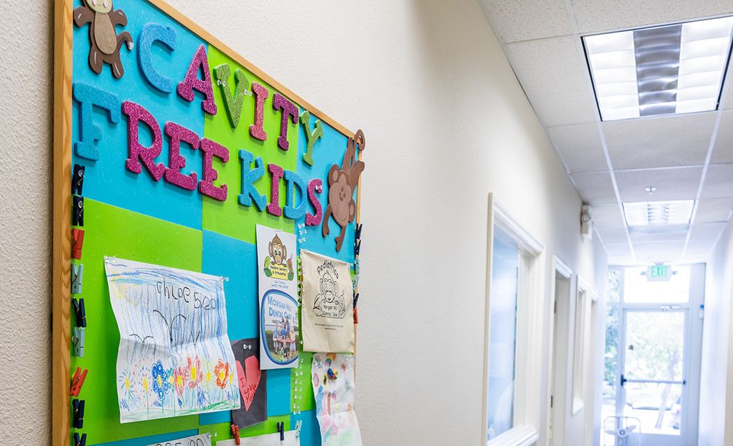 Bulletin board on the wall labeled cavity free kids