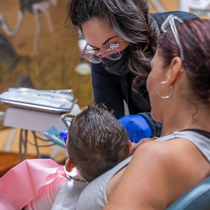 Child receiving a dental checkup