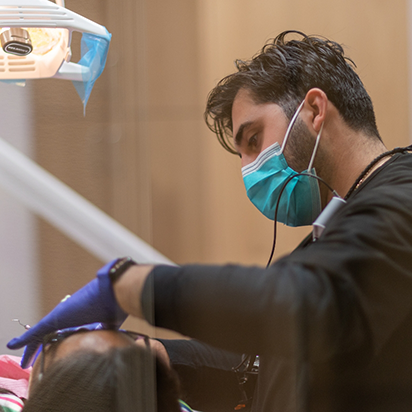 Dentist giving a patient a dental checkup